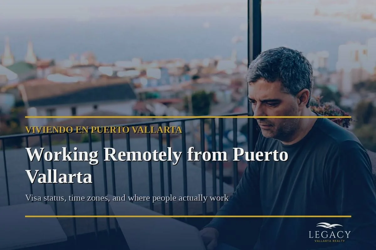 A remote worker on a terrace overlooking Puerto Vallarta